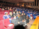 Seated graduates and audience 