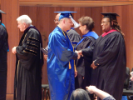Faculty members congratulate graduates