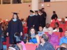 Graduates file into auditorium