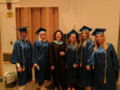 Graduates with a faculty member