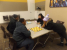 Attendees play a board game