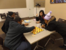 Attendees play a board game