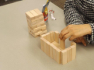 Attendee plays with blocks