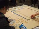Attendees put together a puzzle