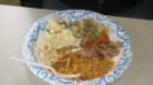 plate of food with rice and other items