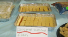 trays of caramel custard flan and other dishes