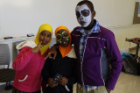 group of kids in costumes and face paint