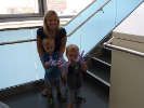Mom and boys on stairwell