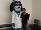 Woman with Doctor Dog mascot