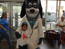 Girl with Doctor Dog mascot