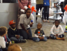 Volunteer in circle with children