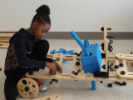 Girl builds a toy