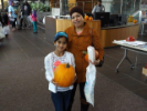 Mother and daughter with pumpkins