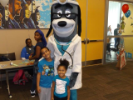 Kids pose with mascot