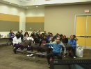Attendees listen to presentation