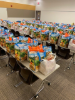 grocery bags filled with food on tables