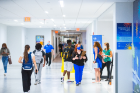 Students and UB community members at outside 1Capen in Capen Hall by the tunnel to Norton Hall on the first day of classes in August 2021. Photographer: Douglas Levere