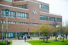 The recently installed UB logo and Capen Hall signs on Capen Hall, photographed in November 2022. Photographer: Douglas Levere
