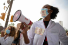 Faculty, students and others associated with the Jacobs School of Medicine and Biomedical Sciences took part in a "White Coats 4 Black Lives" march on Friday, June 6, 2020 from the Jacobs School to Niagara Square in downtown Buffalo. Dr. Ashley Jeanlus organized the march. Photographer: Meredith Forrest Kulwicki