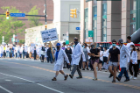 Faculty, students and others associated with the Jacobs School of Medicine and Biomedical Sciences took part in a "White Coats 4 Black Lives" march on Friday, June 6, 2020 from the Jacobs School to Niagara Square in downtown Buffalo. Photographer: Meredith Forrest Kulwicki