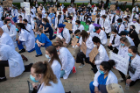 Faculty, students and others associated with the Jacobs School of Medicine and Biomedical Sciences took part in a "White Coats 4 Black Lives" march on Friday, June 6, 2020 from the Jacobs School to Niagara Square in downtown Buffalo. Photographer: Meredith Forrest Kulwicki