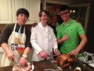 International Students eating Thanksgiving dinner with UB Faculty and Staff. 