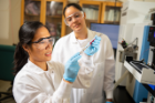 Mary Grace E. Guardian, left, UB PhD candidate, was among the leaders of the new study. She and Cressa Ria P. Fulong, a recent UB PhD graduate who is not pictured, spearheaded experimental and analytical work that took place in the lab. Credit: Douglas Levere / University at Buffalo