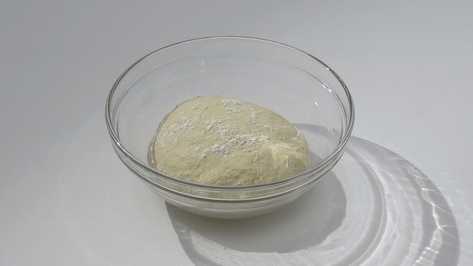 Dough rising in a 100-minute time-lapse animation. 
