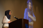 Juweria Dahir, a first-year graduate student in sociology and social policy, spoke about popular media and biases against Muslims in the U.S. Her quote was "ISIS hijacked Islam." Photo: Nancy J. Parisi