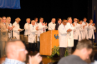 Dignitaries and medical school faculty applaud the class. Photo: Sandra Kicman
