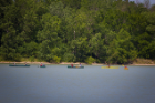 Students in the Intensive English Program explore Lake LaSalle in canoes and kayaks. Program administrators say excursions like this offer students the opportunity to have fun while practicing their English-language skills in a social context. Photo: Douglas Levere