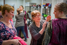 Cutter/draper Judy Curtis (left) looks on as costume shop manager Donna Massimo (center) tends to a fitting with Gianna Palermo, who plays Hippoylta, Queen of the Amazon.