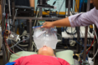 Researchers are using a variety of methods, including a bag of ice water, to determine different temperatures that elicit the human dive reflex.