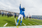 Victor E. Bull, backed by the Thunder of the East marching band. Photo: Paul Hokanson
