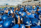 The Bulls get ready to take the field for the homecoming game against Kent State. Photo: Paul Hokanson