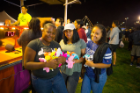 These girls show off their carnival prizes. Photo: Douglas Levere