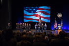 The colors are presented while students from the Buffalo Academy for Visual and Performing Arts sing the national anthem. Photo: Douglas Levere