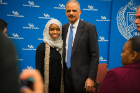 Lafayette High School student Sofia Abam poses with Holder.