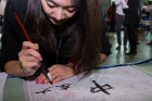 This woman practiced her calligraphy, a revered art form in China for thousands of years.