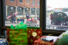 Gifts are loaded into a van parked outside Goodyear Hall.