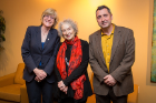 Margaret Atwood (center) poses with College of Arts and Sciences Dean Robin Schulze (left) and David Castillo, director of the Humanities Institute. Photo: Meredith Forrest Kulwicki