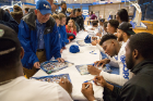 Players sign autographs for fans. Photo: Meredith Forrest Kulwicki
