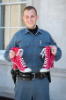 A UB police officer Philip Bauers shows off an athletic pair of pumps.