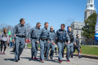 Donning heels for the walk are, from left, UB police officers Dale Zulawski, Anthony Vinci, Philip Bauers, Jason Converse, William Delano and Leo Noe.