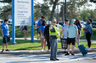 A member of the UB Police Department directs traffic near the Governors Complex on UB's North Campus. Photo: Meredith Forrest Kulwicki