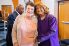 Linda Pessar (left), professor emerita of psychiatry, founder of the Health in the Neighborhood course and a seasoned quilter, with community member Barbara Smith.