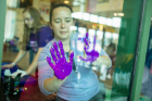 Participants made purple hand prints on windows in the Student Union as another sign of support.