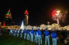 UB's marching band, the Thunder of the East, enjoys the fireworks display over downtown Mobile at the conclusion of the parade and pep rally. Photo: Mark Wallheiser