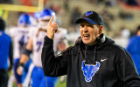 Bulls head coach Lance Leipold disagrees with the referee.