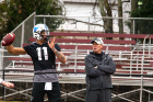 Head coach Lance Leipold talks with quarterback Tyree Jackson during the Bulls final practice.